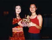 Mingying and Xiumei posing with their birthday cake...